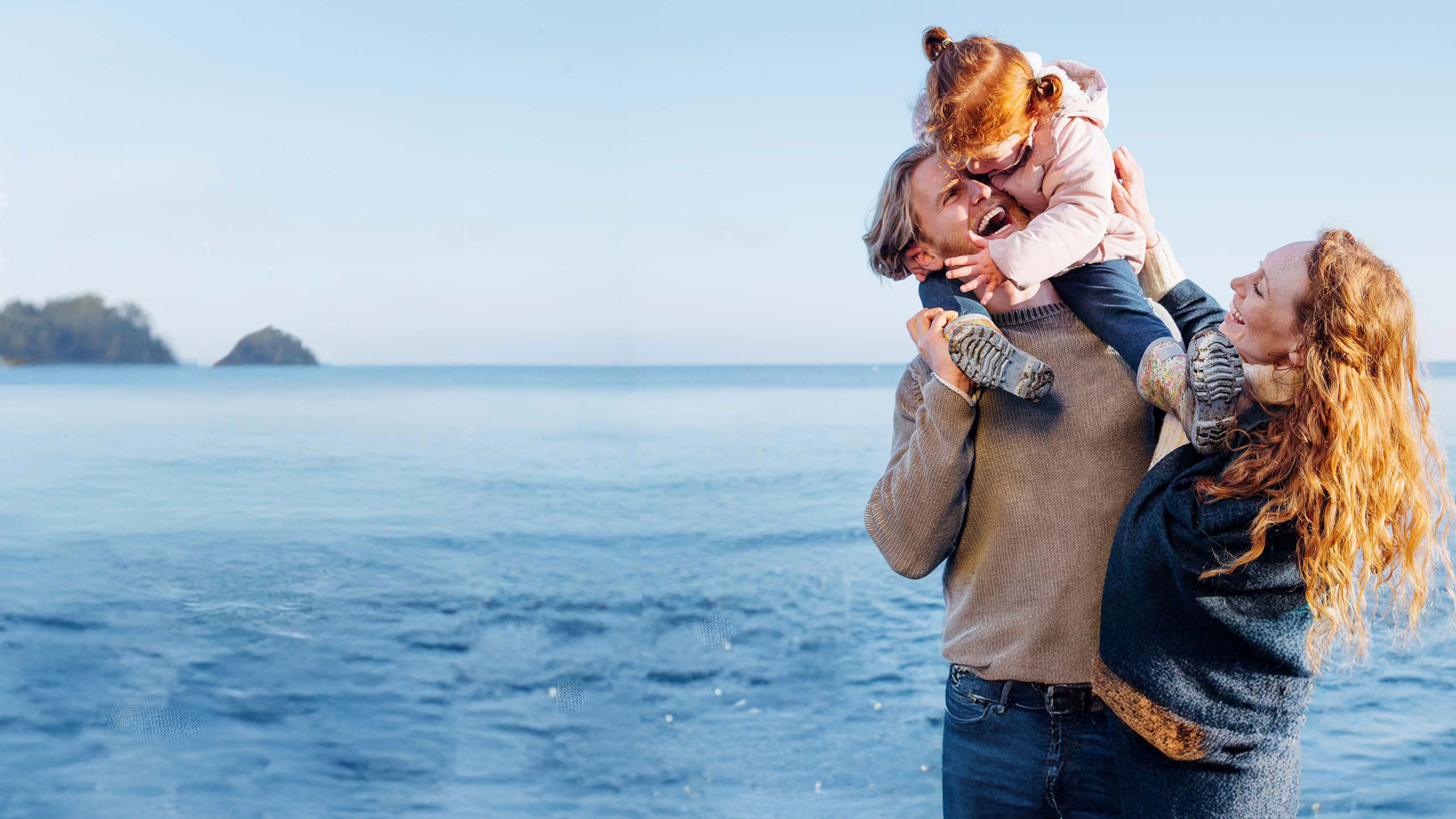 Young family at the beach